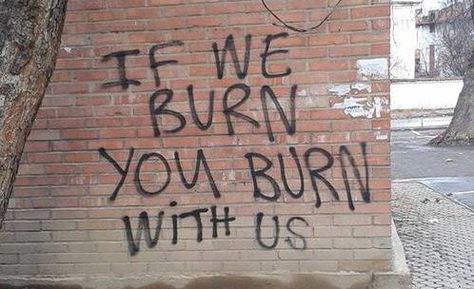 "If we burn, you burn with us," I read aloud, the others gaping at the wall as they lurk behind me in uneasiness. "This must have been written here after the Infestus burned down half of New York City. It's good to know that we're not the alone in this fight." Graffiti Quotes, Frases Tumblr, Katniss Everdeen, The Hunger Games, Mockingjay, American Horror Story, Hunger Games, We Heart It, Street Art