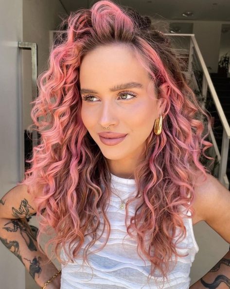 Sunrise Pink Face-Framing Highlights for Brown Curls Pink Peekaboo Hair Curly, Curly Pastel Hair, Naturally Curly Hair Color Ideas, Curly Pink Highlights, Baby Pink Highlights In Brown Hair, Pastel Pink Curly Hair, Light Pink Curly Hair, Hair Dye Ideas For Curly Hair, Curly Pink Hair