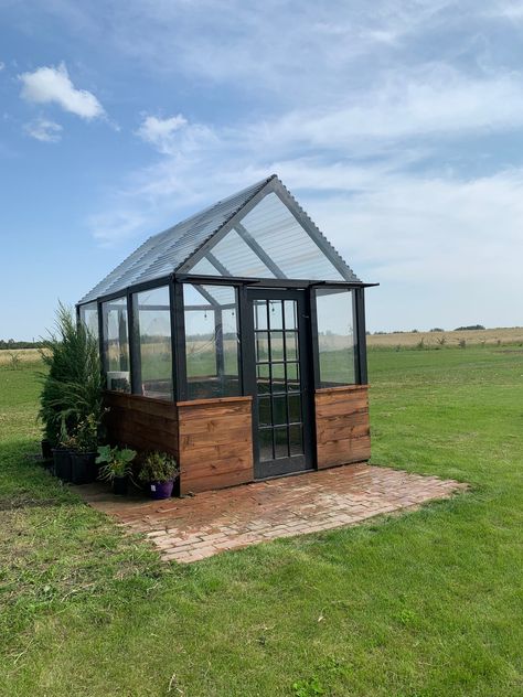 Make your own Post & Beam Greenhouse with twin wall polycarbonate glazing and a concrete foundation! This Timber Frame Style, Western Red Cedar Post and Beam Greenhouse has a footprint that is 10 feet wide and 12 feet long. This modern red cedar and fir structure uses simple joinery and easy to find hardware to construct in your backyard or garden. This plan is an 14 page pdf with fully dimensioned diagrams and construction and assembly instructions, printable on 8.5 x 11 size paper. Dimensions are in inches and millimeters and this plan is designed for actual lumber sizes like you would find at a local sawmill. The plans can be adapted for nominal lumber like you would find at a Big Box Hardware or Building Supply Store. These plans are for download and will not be mailed. See the complet Greenhouse Small Backyard, Green House Diy Greenhouse Plans, Greenhouse Building Plans, House Inside Greenhouse, 10x20 Greenhouse, A Frame Greenhouse, Stained Glass Greenhouse, Modular Greenhouse, Small Backyard Greenhouse