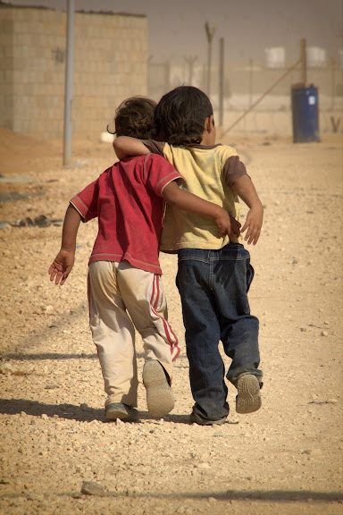 Children find friendship at a refugee camp. {www.care.org} Humanity Photography, Lode A Dio, Old Man Pictures, Syrian Children, Childhood Memories Art, Inspirational Music Quotes, Friendship Photography, Needy People, Hiv Aids