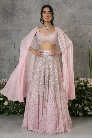 Shop for Pritika Vora Pink Georgette Lehenga With Cape Sleeved Blouse for Women Online at Aza Fashions Sleeves Designs For Lehenga, Cape Lehenga Indian Weddings, Cape Sleeve Indian Dress, Cape Blouse Designs, One Side Sleeve Blouse, Lehenga Blouse Ideas Crop Tops, Lehenga With Sleeves, Indowestern Blouse Designs For Lehenga, Lehenga Sleeves Design