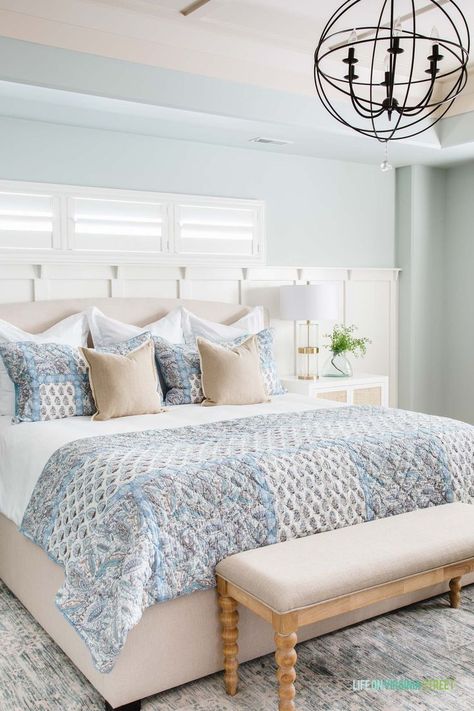 Loving this beautiful master bedroom with blue, tan, and white bedding! The neutral master bedroom colors make it feel so relaxed! #masterbedroom #bedroomdecor #bedroommakeover Georgia Apartment, Mom Room, Bedding Neutral, Batten Board, Bedroom Upstairs, Paisley Bedding, Blue Interiors, Blue Bed, Sphere Light