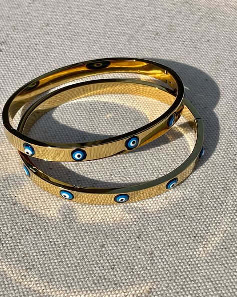 Evil Eye Bangle… 🧿✨ Did you know the belief behind the evil eye symbol dates back almost 3,000 years to ancient Greek & Rome!? It is now mainly linked to Middle Eastern & Turkish culture & is used to ward off variations of evil intentions… It is believed to be one of the strongest symbolic images in the world. Wearing an evil eye as an amulet (good luck charm!) is believed to provide you with protection against evil forces. For example… When someone gives off jealousy vibes, they can cu... Evil Eye Bangle, Evil Eye Symbol, Eye Symbol, Turkish Culture, Luck Charm, Luck Charms, Gemstone Jewellery, Ancient Greek, Middle Eastern