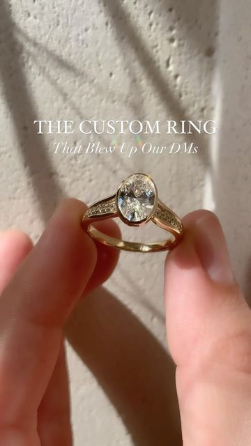 NOT oval - either cushion or emerald 🤍Frank Darling Custom Rings on Instagram: "This engagement ring blew up so much we may or may not be considering adding it to our collection 👀 ⁠ This custom take on our classic Breezy Bezel Solitaire features a glittering pave bridge underneath the bezel set oval and split cathedral shoulders. And the kicker– a soldered-in eternity band to fill the gaps with sparkle ✨⁠ ⁠ The Ring:⁠ • 1.7ct Oval diamond⁠ • F color, VVS2⁠ • 9.72 x 6.68mm⁠ • 2mm band⁠ • 14k YG⁠ ••⁠ ⁠ #ovaldiamond #ovalsolitaire #solitairediamond #bezel #bezelsetting #solitairering #engagementring #splitshank #engagementringinspiration #engagementrings #ovalbezel #solitairerings #solitairediamonds" Platinum Bezel Engagement Ring, Bezel Engagement Ring Oval, Bezel Set Oval Engagement Ring, Bezel Engagement Ring With Wedding Band, Bezel Set Engagement Ring Oval, Oval Bezel Engagement Ring, Engament Rings, Frank Darling, Forever Ring