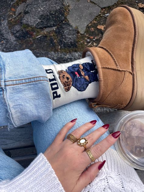 ralph lauren polo socks bear ultra mini platform uggs denim jeans fall outfit coffee gold jewelry rings vintage thrifted inspo vibes aesthetic Ralph Lauren Outfits Women, Polo Ralph Lauren Women Outfits, Teddy Bear Socks, Polo Teddy Bear, Polo Socks, Ugg Socks, Polo Ralph Lauren Outfits, Lauren Aesthetic, Polo Bear Ralph Lauren