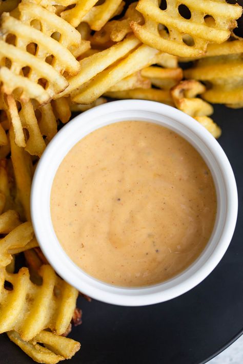 This honey mustard bbq sauce is so creamy, smoky, tangy, and slightly sweet! It's the perfect sauce to serve with french fries, chicken strips, or even on a burger! It's a delicious copycat version of Chick-fil-A's honey roasted BBQ sauce. Honey Roasted Bbq Sauce Chick Fil A, Kfc Honey Bbq Sauce, Chick Fil A Honey Roasted Bbq Sauce, Honey Mustard Bbq Sauce, Honey Mustard Sauce For Pretzels, Spicy Mustard Bbq Sauce, Fries Chicken, Mustard Bbq Sauce, Homemade Bbq Sauce Recipe