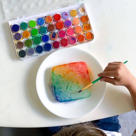 Painting on ice is a fun way to not only be creative with art, but also learn the science behind melting and freezing points! Teaching Colors To Toddlers, Process Art For Kids, Winter Science Experiments, Chemistry For Kids, Ice Painting, Hand Muscles, Spiral Art, Kid Experiments, Teaching Colors