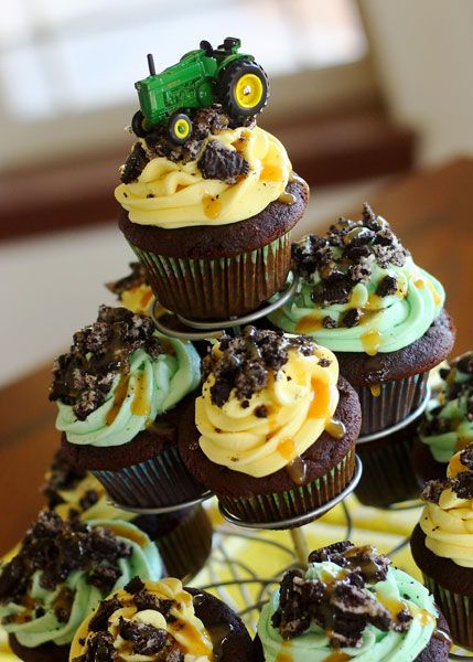 Chocolate, Caramel, Oreo John Deer cupcakes!  Oh yum!...and I absolutely love her blog! Tractor Theme Cupcakes, Tractor Birthday Party Cake, Deer Cupcakes, John Deere Birthday Party Ideas, John Deere Cupcakes, John Deere Birthday Cake, John Deere Cake, John Deere Birthday Party, John Deere Party