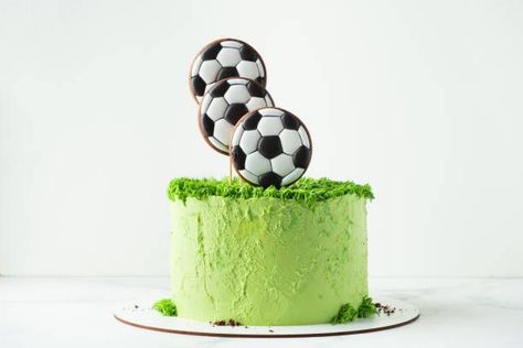 Perfect for the big game. Your family and friends will love these chocolate cupcakes with green buttercream grass and chocolate peanut butter footballs on top. Whether you need a sweet treat for your super bowl party or even a birthday party, these grass-frosting cupcakes are just the ticket. #jsyummy #yummy #sweets #js #best #easy #nice #simple #football #cake #images #birthdaycake #amazing #unique #stunning #marvalous #special #summer #greencream #greenflavor #seo #moist. Simple Football Cake, Green Buttercream, Frosting Cupcakes, Retirement Cake, Ball Cake, Football Cake, Super Bowl Party, Cake Photography, Cupcake Frosting