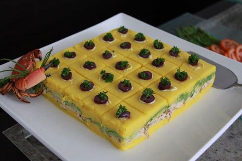 OUR FAVORITE ETHNIC FOODS: PERUVIAN CAUSA RELLENA via Swirl Nation Blog Peruvian Causa Recipe, Beach Food Snacks, Peruvian Appetizers, Peruvian Causa, Appetizers Appetizers, Peruvian Dishes, Pizza Roll, Peruvian Cuisine, Appetizer Menu