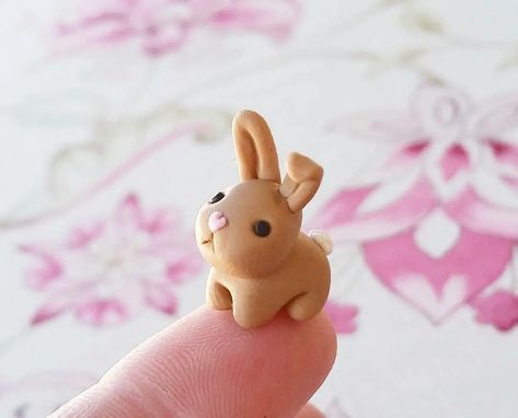 #clay #handmade #ceramics #pottery #art #clayart #sculpture #ceramic #polymerclay #ceramicart #DIY Clay Crafts Bunny, Polymer Clay Bunnies, Bunny Clay Charm, Cute Clay Bunny, Easter Clay Crafts, Air Dry Clay Figurine, Easter Clay Ideas, Air Dry Clay Bunny, Tiny Clay Things