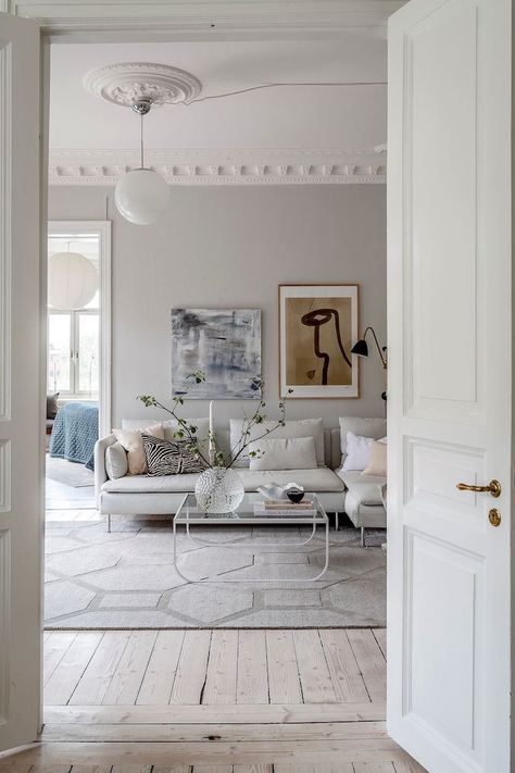 Blue Bedspread, Swedish Apartment, Coco Lapine Design, Oak Chair, Swedish House, Small Home Office, Light Grey Area Rug, Oval Table Dining, White Sofas