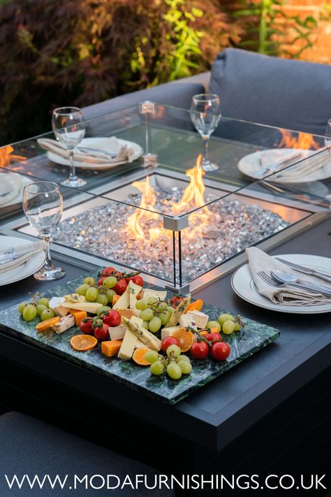 Warm up beside the fire pit table and enjoy a glass of wine with friends in your outdoor living space. Fire Coffee Table, Fire Tables Outdoor, Romantic Patio, Fire Pit Glass, Fire Pit Tables, Fire Pit Coffee Table, Wine With Friends, Fire Pit Outdoor, Luxurious Garden