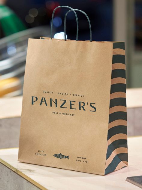 An Iconic London Food Destination Gets a Modern Brand Refresh | Dieline - Design, Branding & Packaging Inspiration Desain Paper Bag, Hand Drawn Logotype, Clean Interior Design, Shopping Bag Design, Paper Bag Design, Kraft Bag, Brand Refresh, London Food, Creativity And Innovation