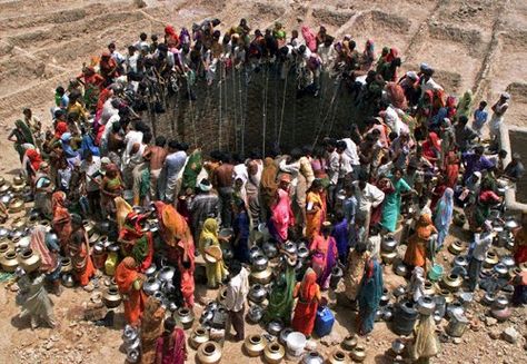 Parched Indian villagers mob a vast well in Natwargadh, Gujarat. In this drought-prone western state, yearly monsoon rains can total less than eight inches, and summer temperatures have topped 115°F. World Water Day, Water Day, World Water, Wuxi, World Population, We Are The World, Water Well, Iconic Photos, People Of The World