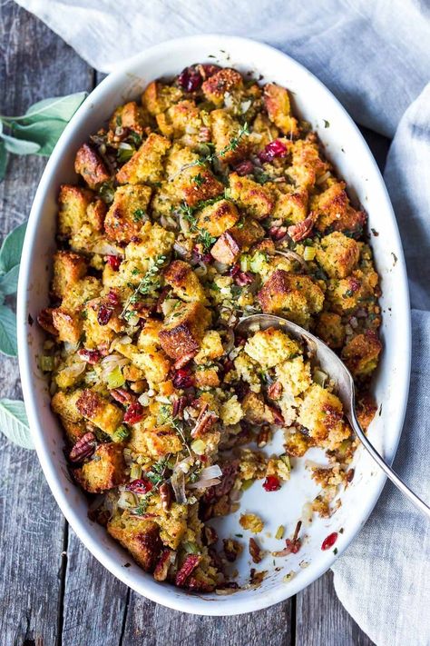 Cornbread Stuffing with Fennel Bulb, Dried Cranberries, and Toasted Pecans is richly flavored and so delicious!  The perfect addition to your holiday table.  This recipe can easily be made a day ahead of baking.  Vegetarian and Gluten-Free adaptable. Thanksgiving Cornbread Stuffing, Thanksgiving Cornbread, Cornbread Dressing With Sausage, Thanksgiving Corn Bread, Cornbread Stuffing Recipes, Cornbread Stuffing, Homemade Stuffing, Sausage Making, Thanksgiving Stuffing