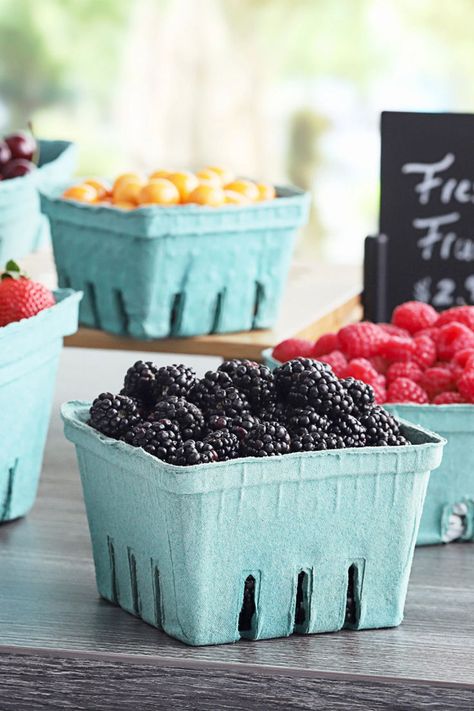 Blue produce baskets with blackberries, raspberries, and tomatoes. Fruit Stand Ideas, Peach Photoshoot, Road Side Stand, Produce Basket, Produce Containers, Mushroom Farm, Produce Baskets, Summer Table Settings, Produce Stand