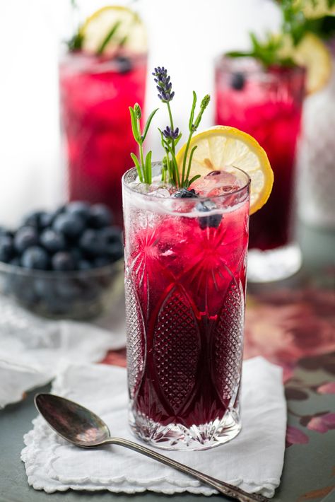 This blueberry lavender soda is a refreshing beverage you can make at home. Perfect for summer barbecues or cooling off after working in the garden!  #blueberry #soda #summerdrinks #recipe #lavender #homemade #nonalcoholicdrink #mocktail #beverage Lavender Soda, Grapefruit Bars, Blueberry Gin, Blueberry Lavender, Chocolate Chai, Vegan Smoothie Recipes, Homemade Soda, Culinary Lavender, Blueberry Syrup