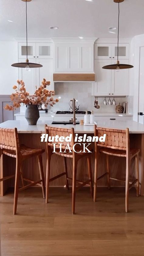 Are we CRAZY?? Maybe 😜 but in the best way! Pole wrap is the easiest solution to adding warmth to your kitchen and getting a custom fluted island! COMMENT “island hack” and I will send you all the supplies + everything you see in my kitchen. Plus there is a step by step tutorial saved to the highlights on my page! Would you try this hack?? What questions do you have?? #kitchendiy #homeimprovement #affordablehome #homehacks | Alexis Nicole | affordable home design | Siggerr · Moon Renovated Cabinets, Fluted Island Kitchen, Pole Wrap Kitchen Island, White Kitchen Modern Farmhouse, Pole Wrap Kitchen, Fluted Island, White Backsplash Kitchen, Alexis Nicole, Diy Kitchen Islands