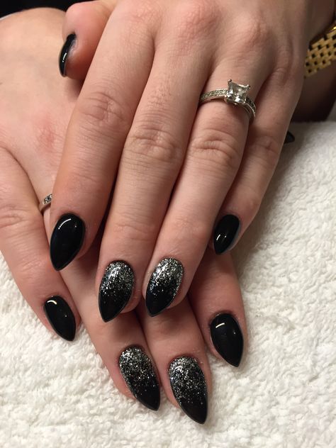 Black with glitter ✨ Black Nails With Glitter Almond, Black Nails Glitter Accent, Black And Silver Almond Nails Designs, Black Disco Nails, Black Nails Glitter Tips, Black Almond Nails Designs Ideas, Black Glitter Nails Coffin, Black Glitter Halloween Nails, Black And Silver Nails Almond