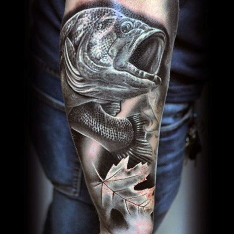 Mens Half Sleeve Tattoo In Black And White With Bass And Leaf Bass Fish Tattoo For Men, Bass Fishing Tattoo For Men, Fishing Tattoo For Men, Leaf Arm Tattoo, Finn Tattoo, Bass Tattoo, Bass Fishing Tattoo, Arm Tattoo Design, Fishing Tattoos