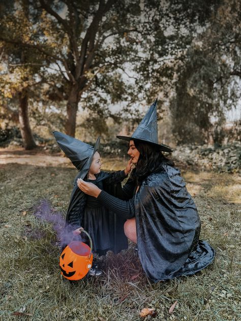 Witch costume mom and daughter photoshoot Mom Daughter Witch Costume, Mom And Daughter Halloween Photoshoot, Toddler Witch Photoshoot, Mother Daughter Witch Costumes, Mom And Daughter Witch Costumes, Baby Witch Photoshoot, Witch Family Costumes, Witch Mom And Daughter, Mom And Daughter Costumes Halloween