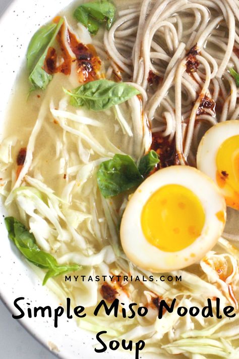 This Simple Miso Noodle Soup is the solution for a quick supper on a busy day. Chicken Broth, Soba Noodles, Miso, and Cabbage make for a simple and healthy supper that is ready in only 15 minutes! We like to top ours with Ramen Eggs for the win! Rice Noodle Miso Soup, Miso Broth Soup, Miso Soba Noodle Soup, Miso Soba Noodles, Rice Noodle Soup Recipes Easy, Chinese Noodle Soup, Asian Soup Bowls, Soba Noodle Soup, Diy Ramen