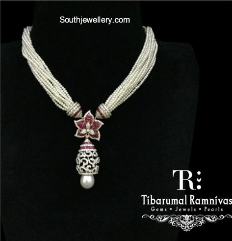 Multi string short pearl necklace with diamond ruby pendant by Tibarumal Ramnivas jewellers. Pearl necklace designs, indian jewellery designs, mutyala necklace designs Moti Pendant Set, Gold Diamond Jewelry With Pearl Pendant, Diamond Jewelry With Pearl Pendant, Diamond Pendant With Pearl Mala, South Indian Diamond Pendant, Diamond Pendant Jewelry, Diamond Pendant Sets, Evil Eye Necklace Gold, Diamond Necklace Designs