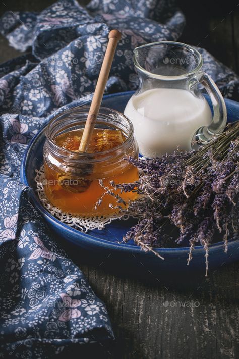 Honey, milk and lavender by NatashaBreen. Open glass jar of liquid honey with honeycomb and honey dipper inside, glass jug of milk and bunch of dry lavender in... #AD #Open, #glass, #jar, #NatashaBreen Glace Fruit, Honey Milk, Honey Photography, Brown Spots Removal, Honey Dipper, Organic Honey, Proper Nutrition, Milk And Honey, Healthy Nutrition