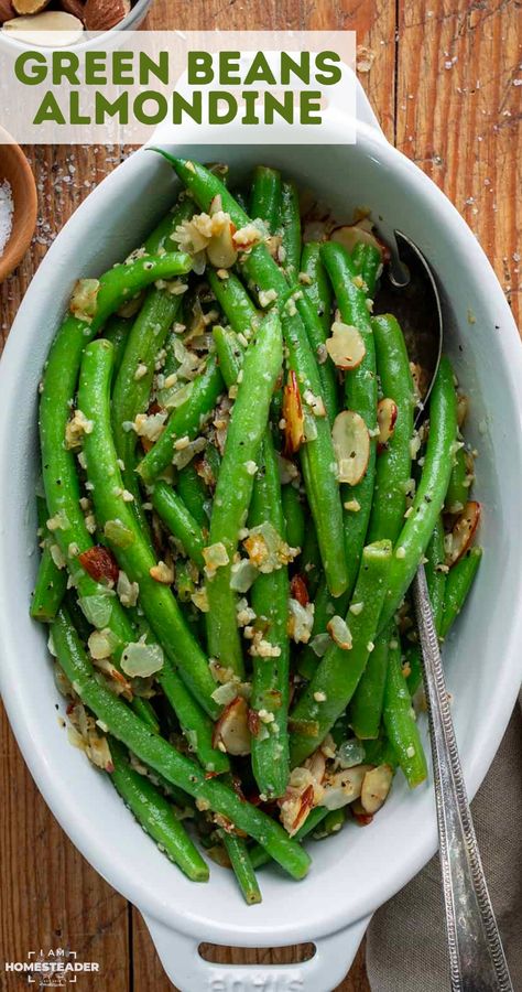 Green Beans Almondine is a vegetable side dish with crisp, tender green beans mixed with sauteed onions, toasted almonds, and garlic. The combination of fresh green beans, almonds, and buttery goodness creates a wonderful medley of flavors and textures, making Green Beans Almondine a timeless addition to any meal. Buttery Green Beans, Green Beans With Almonds Sauteed, Green Beans Almonds, Blanched Green Beans, Unique Side Dishes, Green Beans With Almonds, Green Beans Almondine, Sauteed Onions, Blanching Green Beans