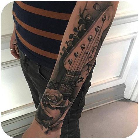 https://www.facebook.com/tattoodo.com/photos/a.352302061544131.82643.351043461669991/1039218136185850/?type=3 Fender Tattoo, Music Tattoo Sleeves, Parent Tattoos, Men Tattoos Arm Sleeve, Head Tattoo, Guitar Tattoo, Best Tattoo Ideas, Black Dahlia, Fender Guitar