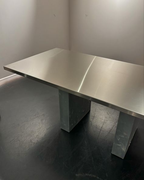 Vintage Habitat dining/ display table with stainless steel top and Zinc covered block legs 🤌🏾 We had the top of this table wrapped in stainless steel for the @refybeauty event and it turned out better than I imagined. This one is for rent or sale… #stainlesssteel #steeltable #bespoketable #vintagehabitat #habitatdiningtable Stainless Steel Table Kitchen, Dining Display, Steel Dining Table, Stainless Steel Table, Display Table, Aluminum Extrusion, Long Table, Steel Table, Habitat