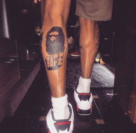 Fresh Bape Tattoos Design, Chris Brown Tattoo Ideas, Bape Tattoos, Dragon Ball Z Tattoo, Calf Sleeve Tattoo, Brown Tattoo, Chris Brown Photoshoot, Brown Dragon, Black Men Tattoos