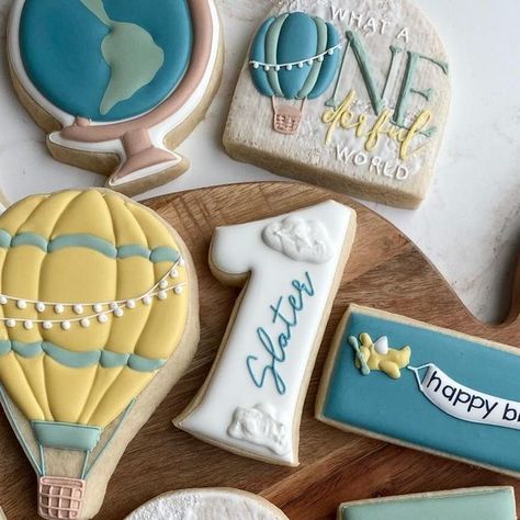 Alyssa | Cookie Artist on Instagram: "What a ONEderful world first birthday cookies :)" What A Onederful World Birthday Cake, Onederful Birthday Cookies, What A Wonderful World Birthday Party, What A Onederful World Birthday, Onederful World Birthday Boy, Onederful Birthday, Isn’t She Onederful Birthday Cookies, Airplane Cookies, Hot Air Balloon Cookies