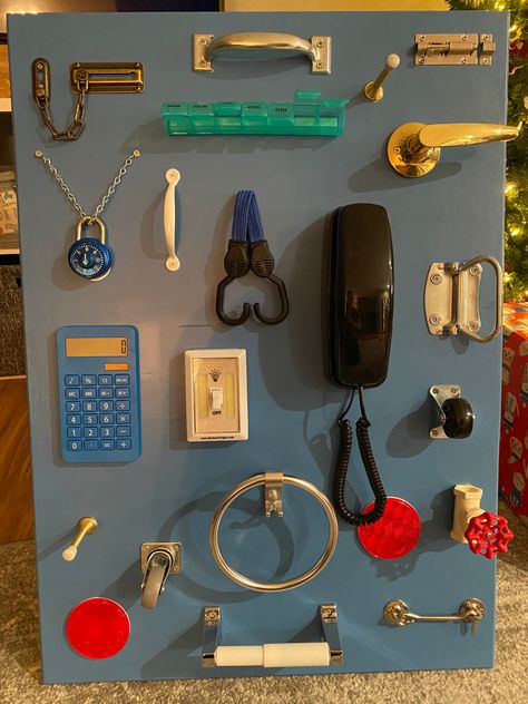 Homemade Toddler Busy Board with supplies from Menards, Amazon, & around the house. Lock And Key Busy Board, Toddler Busy Board Diy, Homemade Busy Board, Diy Busy Board Toddler, Diy Toddler Busy Board, Busy Board Ideas, Fidget Board, Diy Busy Board, Toddler Busy Board