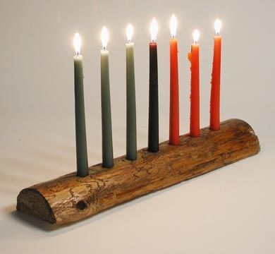 The seven candles in the kinara represent the seven principles of Kwanzaa. By making the kinara, your family will celebrate kuumba (creativity), one of the Kwanzaa principles. Diy Kwanzaa Decorations, Kinara Kwanzaa, Principles Of Kwanzaa, Seven Principles Of Kwanzaa, Kwanzaa Celebration, Kwanzaa Party, Kwanzaa Crafts, Kwanzaa Decorations, Kwanzaa Principles