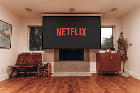 Fireplace With Projector Screen, Projector Over Fireplace, Projector Fireplace, Movie Projector Living Room, Hidden Projector Screen Living Room, Projector Living Room Ideas, Living Room Projector Setup, Projector In Living Room, Projector Screen Living Room