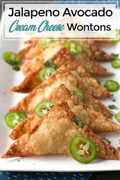 If you love jalapeño poppers, you are going to flip out over these Jalapeño Avocado Cream Cheese Wontons! The creamy and spicy filling wrapped in crispy wonton wrappers makes these poppers a fantastic party appetizer (or afternoon snack...). | cakenknife.com #tailgating #appetizer #partyrecipe #easyappetizer Avocado Cream Cheese, Wonton Appetizers, Cheese Wontons, Cream Cheese Wontons, Wonton Recipes, Avocado Cream, Wontons, Jalapeno Poppers, Yummy Appetizers