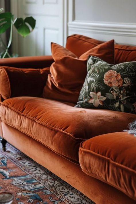 Rust Velvet Sofa: My Chic Living Room Update Velvet Sofa Cover Ideas, Rust Velvet Sofa Living Room, Cinnamon Velvet Sofa, Living Room With Burnt Orange Couch, Colorful Sofas Ideas Living Room, Rust Velvet Couch, Rust Couch Living Room, Velvet Furniture Living Room, Burnt Orange Couch Living Room