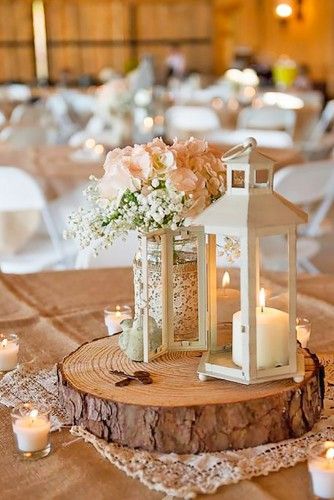 lantern wedding centerpiece 24 Lantern Centerpiece Wedding, Mason Jar Lanterns, Rustic Wedding Decorations, Lantern Centerpieces, Wedding Lanterns, Mason Jar Wedding, Rustic Wedding Centerpieces, Rustic Chic Wedding, Wedding Table Centerpieces