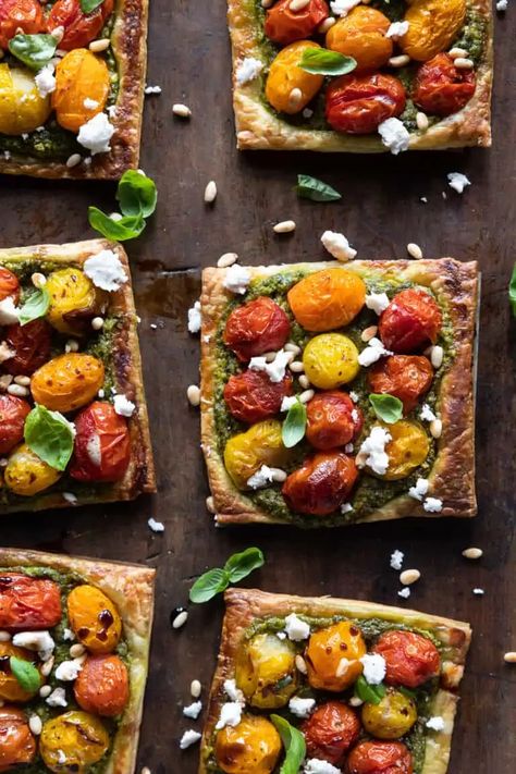 Easy Vegan Tomato Tarts with Pesto | Heartful Table Tomato Tartlets, Cherry Tomato Tart, Tomato Tarts, Raw Treats, Vegan Feta, Bruschetta Toppings, Vegan Feta Cheese, Vegan French, Vegan Holiday Recipes