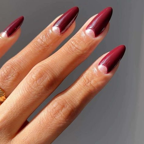 17 Burgundy French Manicures With Chic, Moody Energy for Fall Fall Nails Burgundy French Tip, French Tip Maroon, Merlot Nails Design, Maroon Nail French Tips, Burgundy Gold French Nails, Almond Burgundy French Tip Nails, French Manicure Burgundy, Burgundy Glazed Nails, Checkered Nails