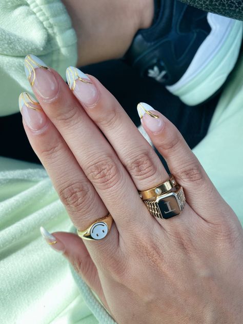 White Nails With Gold Accent French Tips, Gold And French Nails, White And Rose Gold French Tip Nails, Almond French Tip Nails With Gold Design, Nails With Gold Detailing, Almond French Tip With Gold Line, Design On French Tip Nails, French Tip Designs Acrylic Almond, Gold Nail Aesthetic