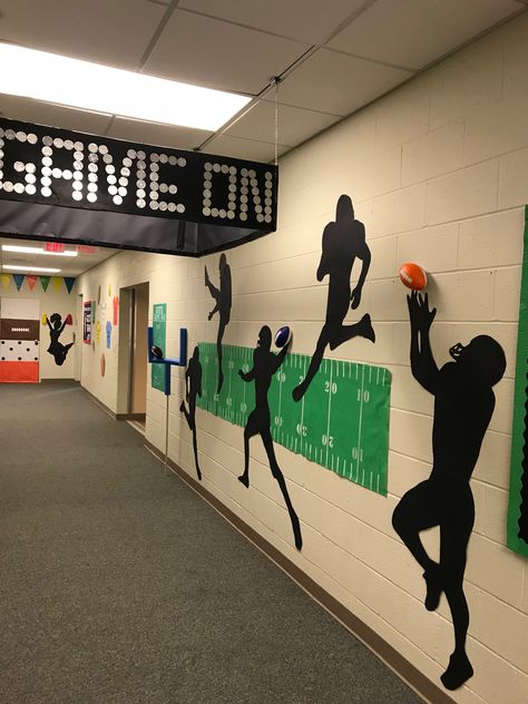 Men Classroom Theme, Decorating Ideas For Football Locker Room, Pe Room Ideas, Sport Themed Classroom Ideas, Hoco Hallways Themes, Sports Themed Classroom Door Designs, Sports Themed Hallway Decorations, Sports Themed School Hallway, Athletic Bulletin Boards High Schools