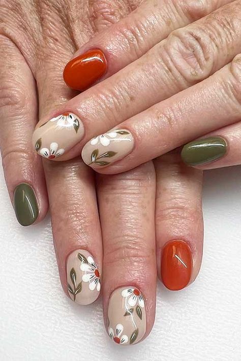 Burnt orange and olive green nails Fall Green And Orange Nails, Forest Nail Design, Autumn Nails Green And Orange, Light Green Fall Nails, Olive Green And Orange Nails, Sage Green And Orange Nails, Burnt Orange And Green Nails, Fall Wedding Nails For Bride Burnt Orange, Green And Orange Nails Fall