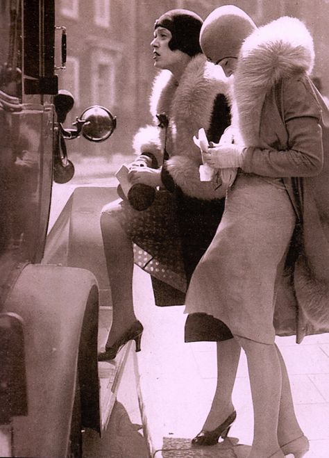 Two well dressed flappers iin short skirts & heels,  helmet style cloche hats & fur trimmed coats, alight from a taxi at a polling station  in May 1929 to vote in the U.K General Election From Retro Fashion by Lucinda Gosling (2015) (please follow minkshmink on pinterest) #flappers #twenties 1920s Fashion Flapper, Daria Petrilli, Cloche Hats, Fur Trim Coat, Skirt Heels, 30s Fashion, Flapper Girl, 20s Fashion, Black Tie Event