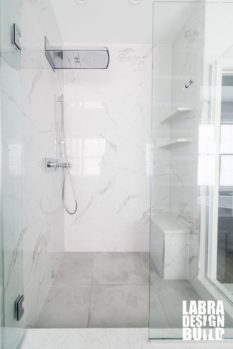 Labra Design+Build | White Marble Tile Shower Bathroom Remodel White Marble Tile Bathroom, Large Tile Bathroom, White Marble Shower, Marble Shower Tile, White Tile Shower, White Marble Bathrooms, Marble Tile Bathroom, Full Bathroom Remodel, White Marble Tiles