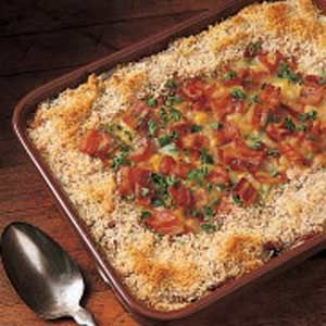 Iowa Corn Casserole Recipe -I only wish I knew how many times I've made this dish for reunions and other get-togethers during the past 40 years. It seems no matter how much I make, there are never any leftovers. I've even gotten long-distance recipe requests from people who've moved away and miss my corn casserole. Corn Casserole With Bacon, Pretzels And Beer Cheese, Iowa Recipes, Cheesy Hash Brown Casserole, Bacon Bread, Casserole With Bacon, Holiday Casseroles, Sides Dishes, Corn Casserole Recipe