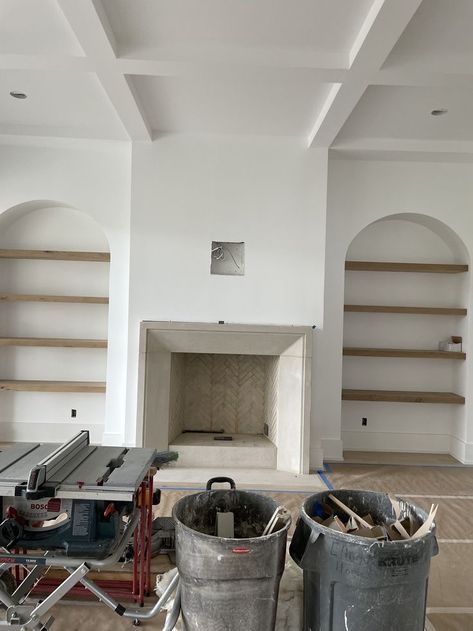 Small Fireplace Renovation, Minimilastic Bedroom Design, Fireplace With Curved Built Ins, Fireplace Narrow Built Ins, Large Fireplace With Built Ins, Plaster Fireplace With Bookshelves, Modern Open Fireplace, Arch Bookshelf Built Ins Fireplace, Stucco Built In Shelves