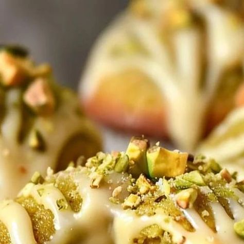 Chef zouheir on Instagram: "🤍💚 White Chocolate Pistachio Muffins 😋🧁

Ingredients:
1 1/2 cups all-purpose flour
1/2 cup granulated sugar
1/2 cup packed light brown sugar
1/2 teaspoon baking powder
1/4 teaspoon baking soda
1/4 teaspoon salt
1/2 cup unsalted butter, melted and cooled
2 large eggs
1/2 cup plain Greek yogurt
1/4 cup milk
1 teaspoon vanilla extract
1 cup shelled pistachios, finely chopped
1 cup white chocolate chips, melted
Directions:

Preheat your oven to 350°F (175°C) and line a muffin tin with paper liners.
In a large bowl, whisk together the flour, granulated sugar, brown sugar, baking powder, baking soda, and salt.
In another bowl, combine the melted butter, eggs, Greek yogurt, milk, and vanilla extract.
Add the wet ingredients to the dry ingredients and mix until just Eggs Greek Yogurt, Shelled Pistachios, Asian Cakes, Pistachio Muffins, Amazing Cupcakes, Melted White Chocolate, Asian Cake, Chocolate Pistachio, Healthy Freezer Meals